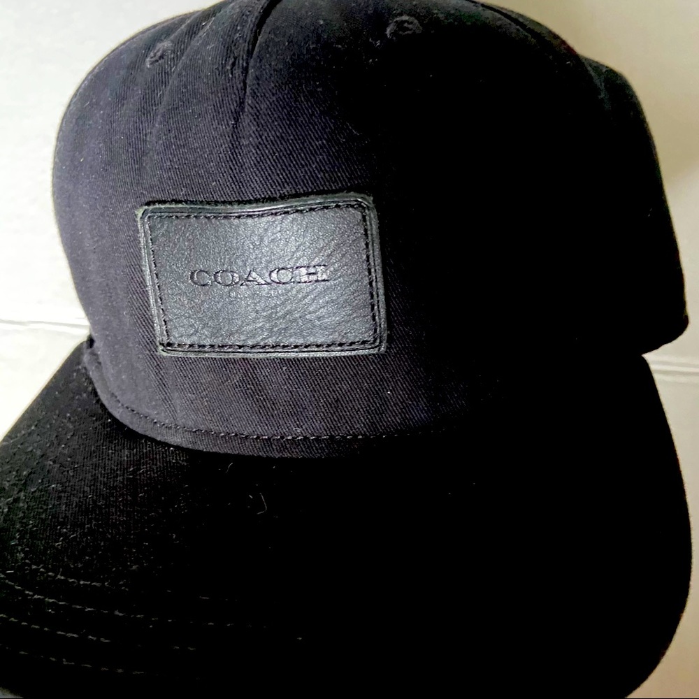 Black leather label and strap coach cap